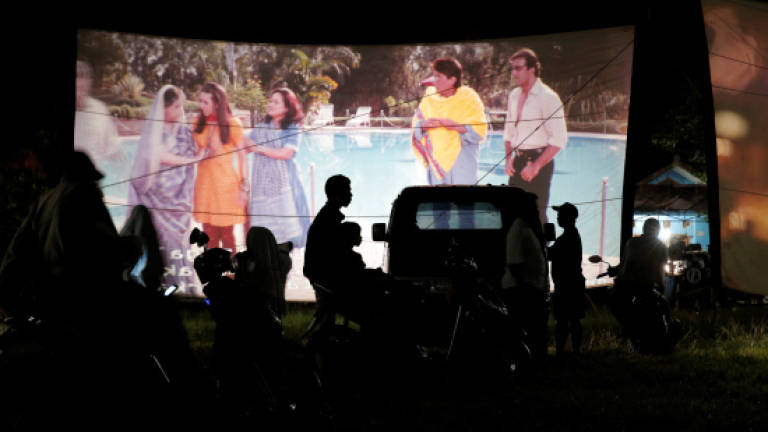 Indonesian mobile cinema keeps old film format alive in digital age