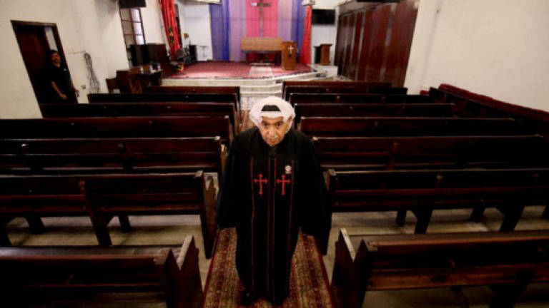 Kuwait's homegrown priest celebrates Bible and bedouin culture