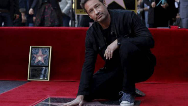 'X-Files' actor Duchovny gets Hollywood Walk of Fame star