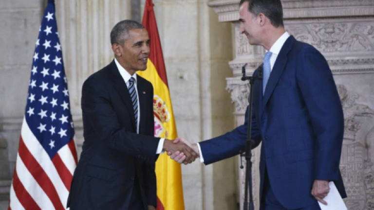 Obama visits Spain on symbolic but curtailed trip