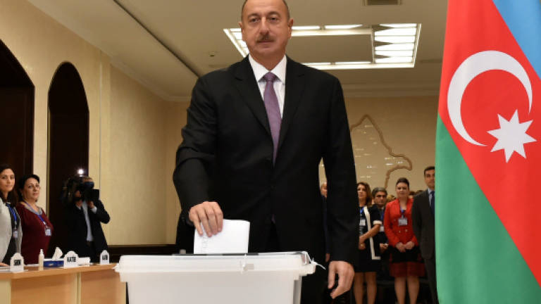 Azerbaijan strongman Aliyev holding firmly on to power