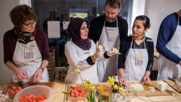 From fleeing Syria to dazzling Merkel in the kitchen