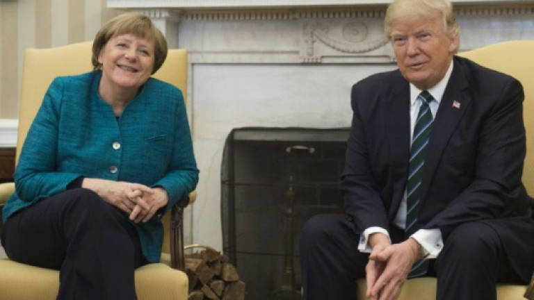 Merkel in Washington to make Germany heard again