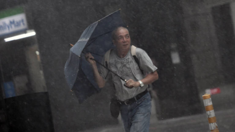 Typhoon Megi kills four, leaves trail of damage in Taiwan