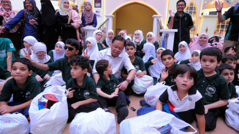 Syrian children excited to celebrate first, peaceful Aidilfitri in Malaysia