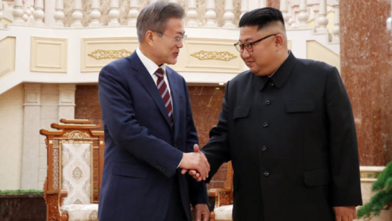 S. Korean leader and North's Kim hold summit talks