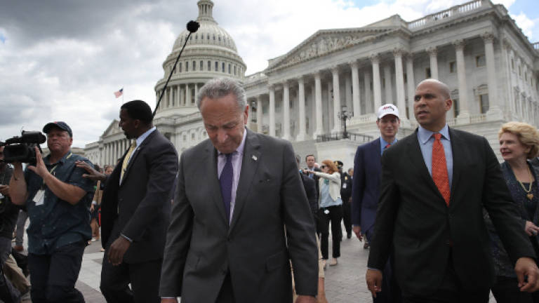 US Senate advances health care bill, tough debate looms