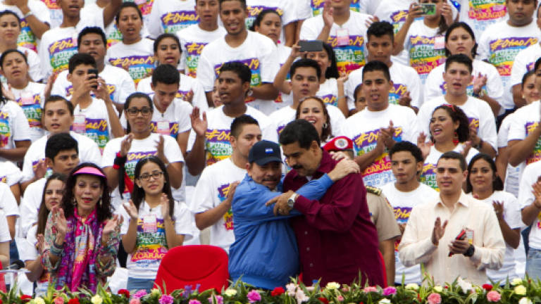 Venezuela holding US newlywed for fomenting unrest