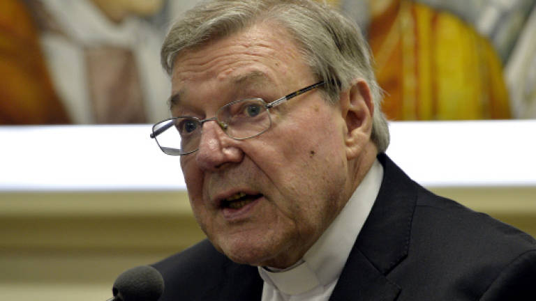 Pope aide Pell charged with child sex abuse (Updated)