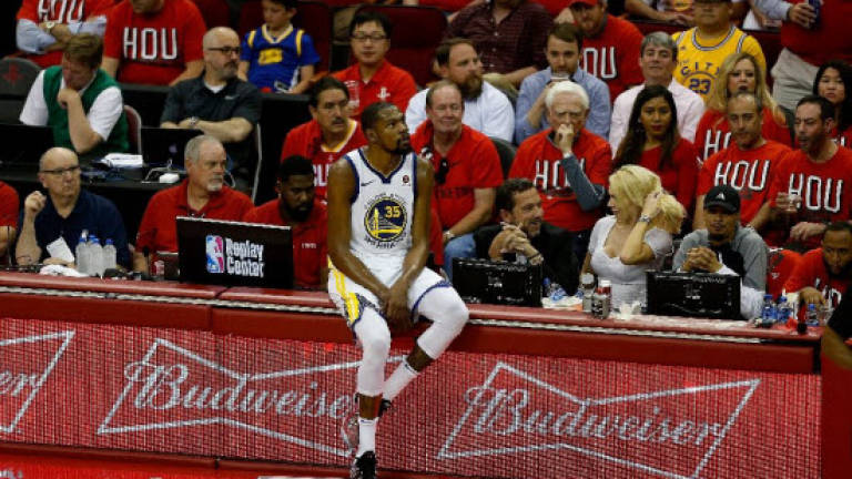 Durant, Thompson power Warriors over Rockets in NBA playoffs
