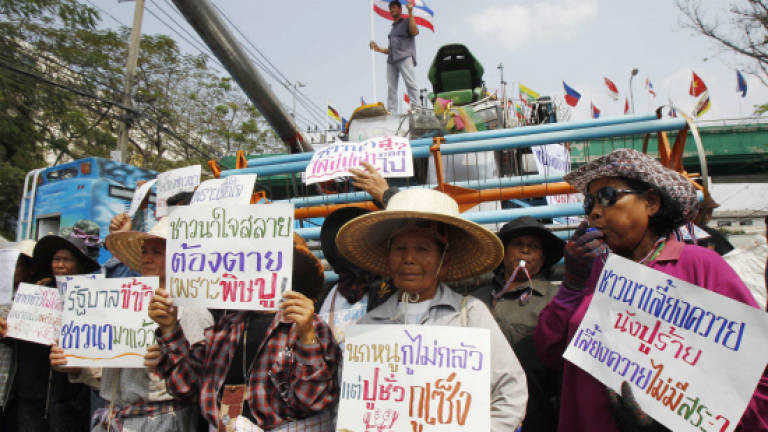Thai protesters march to support unpaid rice farmers