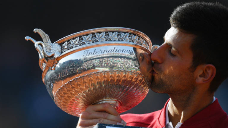 Djokovic, sick-note Serb to Grand Slam king