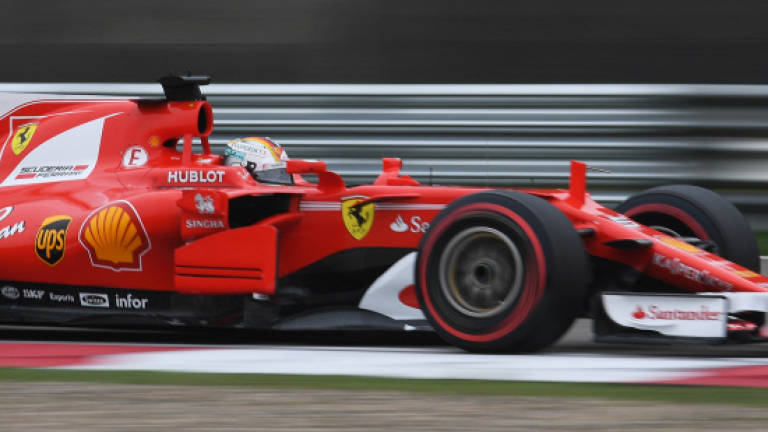 Vettel sets blistering pace in China