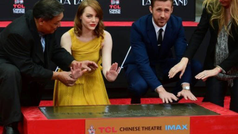 Ryan Gosling, Emma Stone immortalised in Hollywood cement