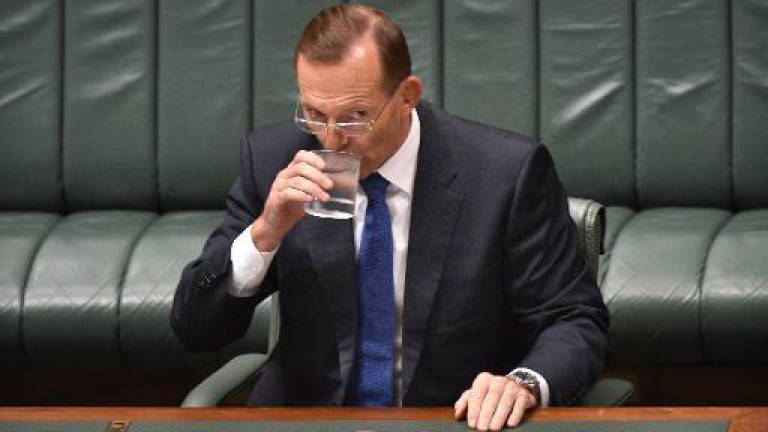 Australian PM Abbott bats away leadership speculation