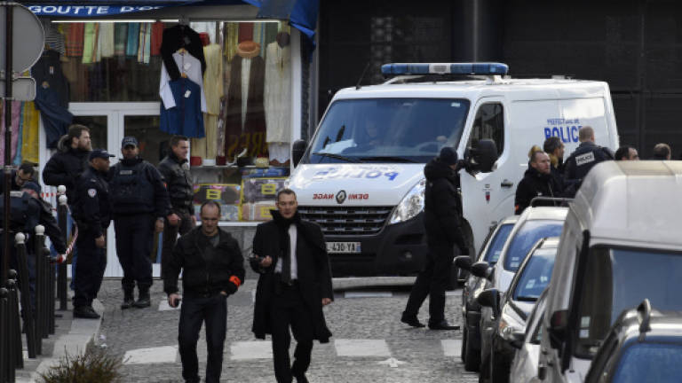 Man shot dead attacking police on Charlie Hebdo anniversary