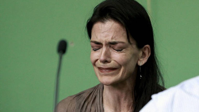 Costa Rica court clears US woman of killing husband Costa Rica court clears US woman of killing husband