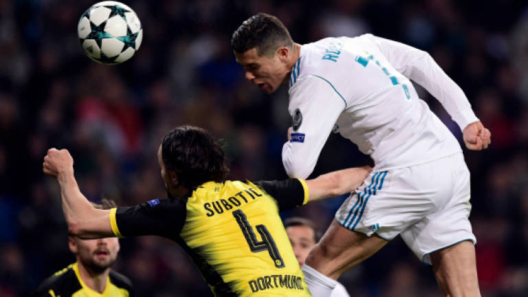 Ronaldo breaks new ground as Madrid edge out Dormund