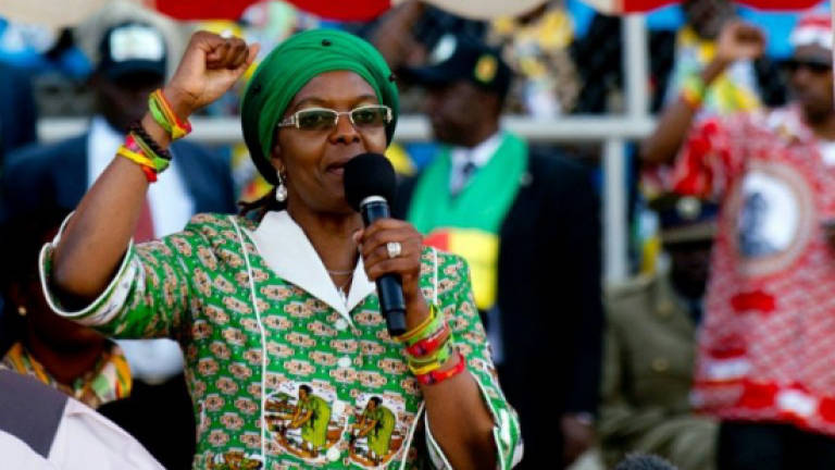 S.African model challenges Grace Mugabe's immunity