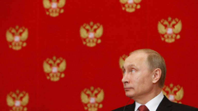 Putin describes secret operation to seize Crimea