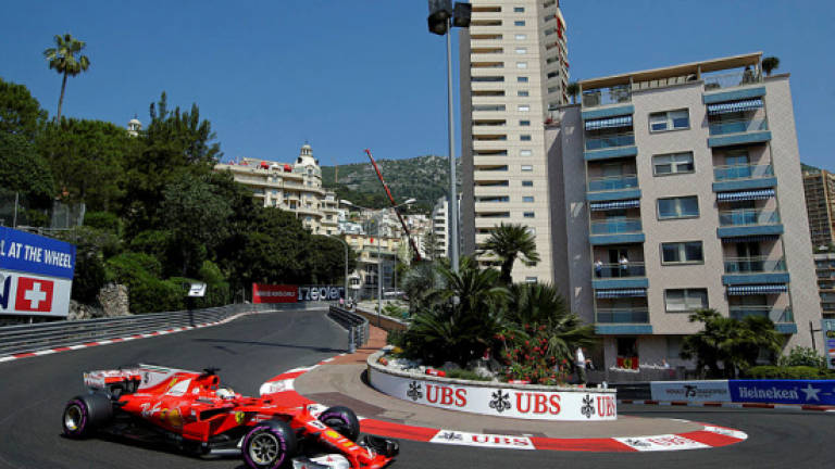 Vettel, Ferrari on top as Mercedes trail again