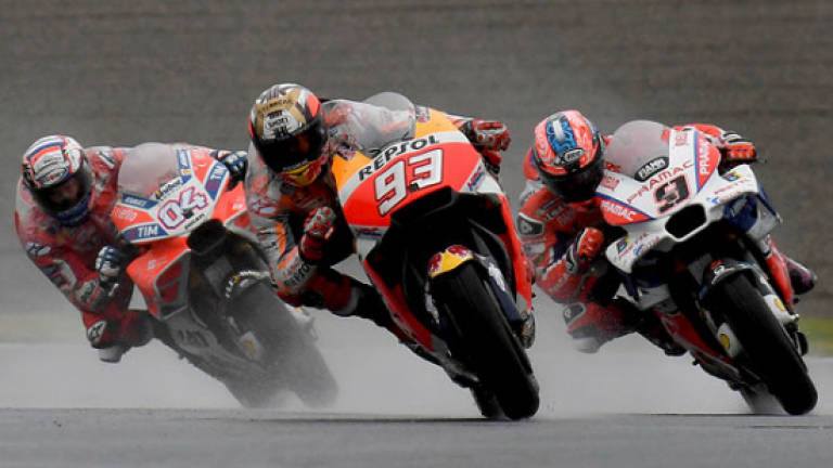 Dovizioso wins Japan thriller to cut Marquez lead