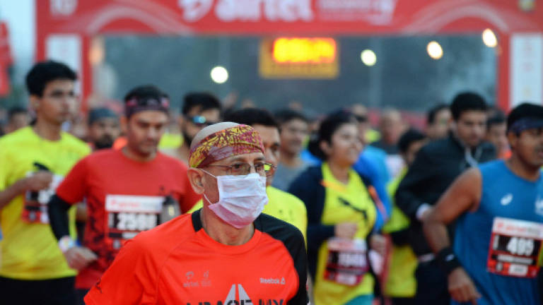 Delhi half-marathon goes ahead despite smog, health warnings