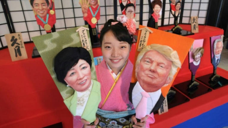 Japan swinging into 2017 with Trumped-up good luck charm