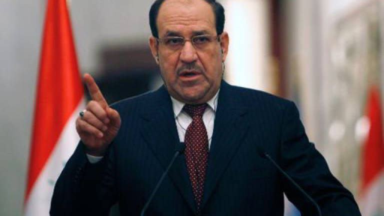 Iraqi PM under fire amid 'insanity' of suicide bombings