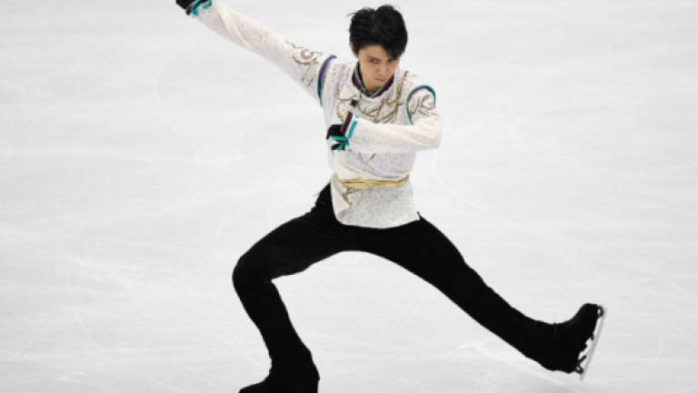 Figure skating champ Hanyu skips team event