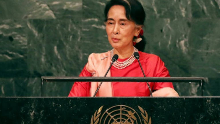 Suu Kyi pledges to uphold rights in UN debut