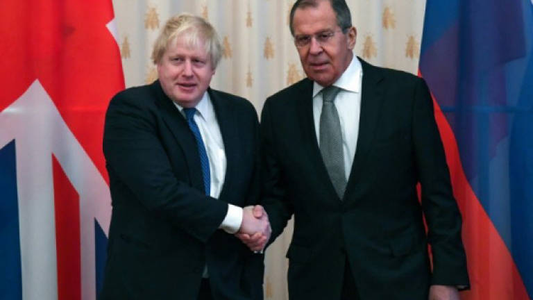 Britain's Johnson, Lavrov exchange smiles and barbs on Moscow visit