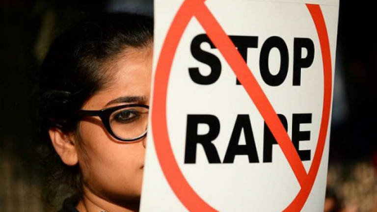 India police investigate Modi party lawmaker over rape