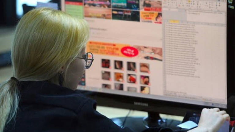Battle of the online sex crimes in high-tech S. Korea