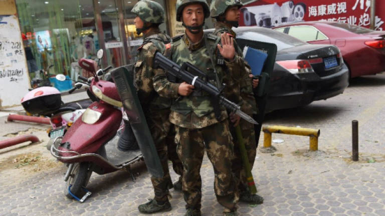 China police kill three over Xinjiang attack: Report