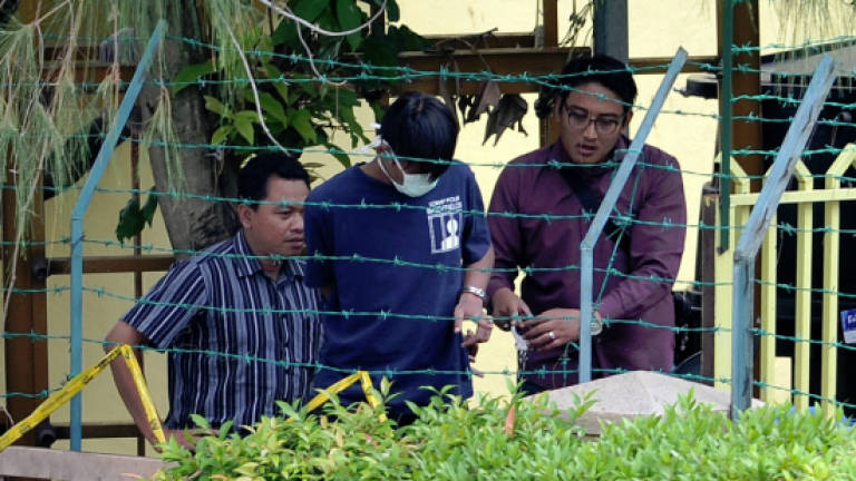 Suspect brought back to Tahfiz school to retrace steps