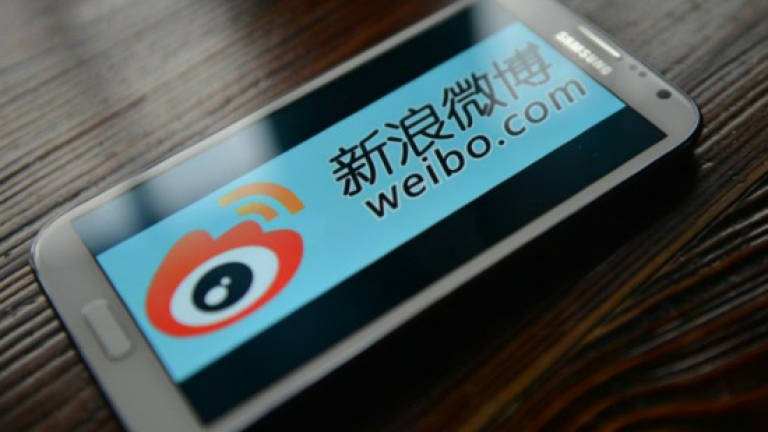 China fines tech firms over online content