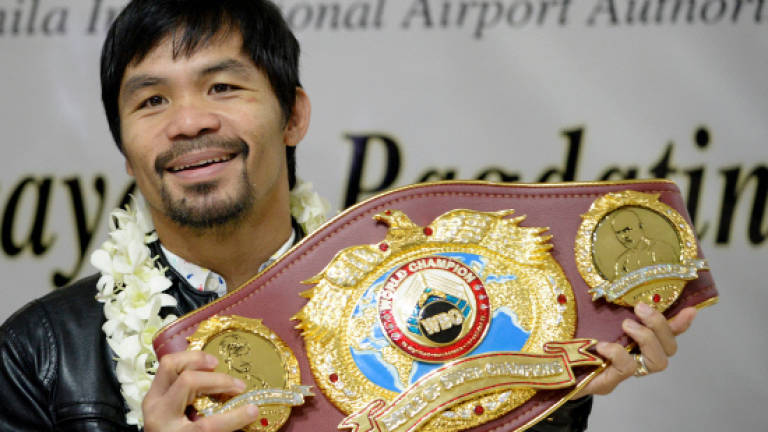 Pacquiao declares 'I'm not done yet'