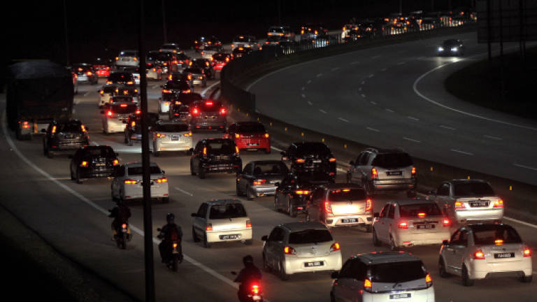 Night traffic at a crawl on major highways