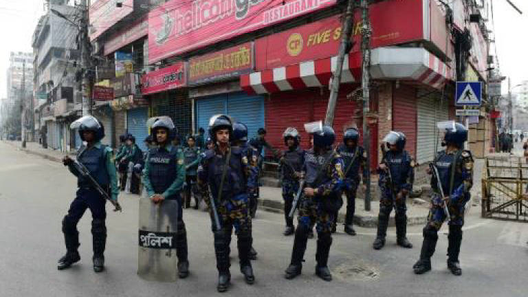 Bangladesh police clash with protesters ahead of Zia verdict