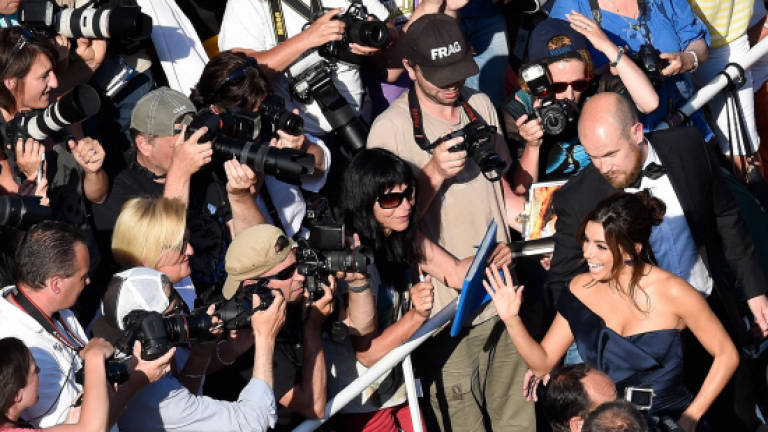 Behind Cannes's glitz, B-grade movies do booming TV trade Behind Cannes's glitz, B-grade movies do booming TV trade