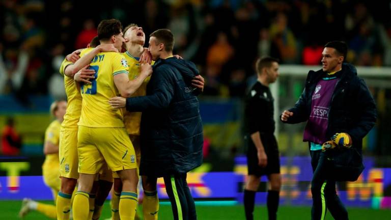 Football - Euro 2024 Qualifier -Play-Off- Ukraine v Iceland - Stadion Miejski Wroclaw, Wroclaw, Poland - March 26, 2024Ukraine players celebrate after qualifying for Euro 2024 - REUTERSPIX