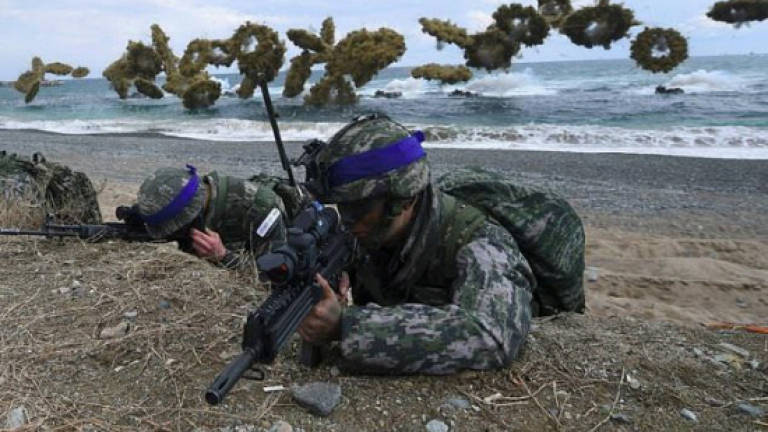 US, S. Korea confirm suspending military drills