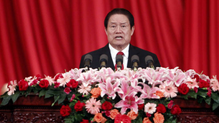 China security chief's fall cements Xi's grip on power, says analysts