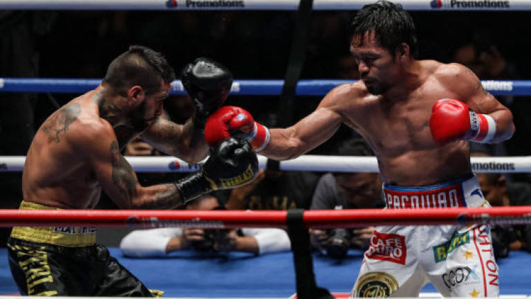 'Smoking hot' Pacquiao, 39, rolls back years to knock out Matthysse