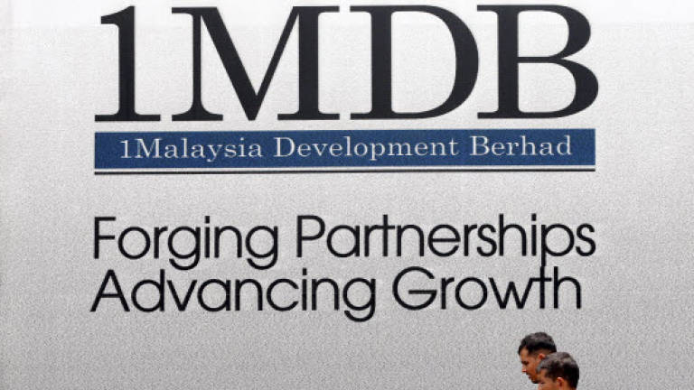 ‘Why must 1MDB park RM4b in Singapore bank?’