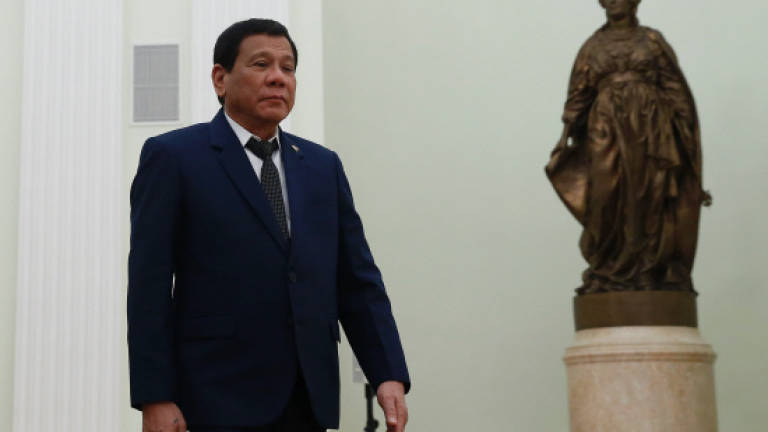 Duterte vows 'harsh' martial law in southern Philippines