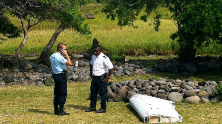 MH370 enigma swirls as debris to be probed