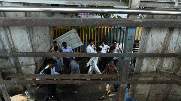 Mumbai commuter stampede leaves at least 22 dead