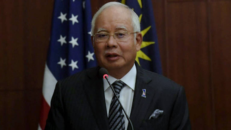 Najib coy on general election date